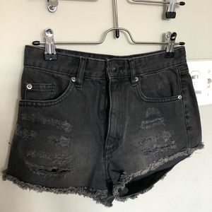 Black distressed jean shorts